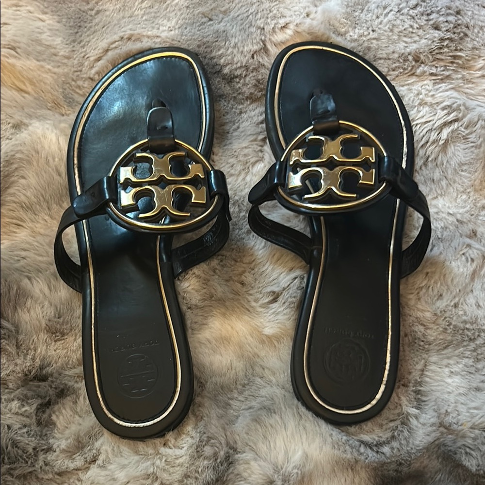 Tory Burch sandals in black and gold